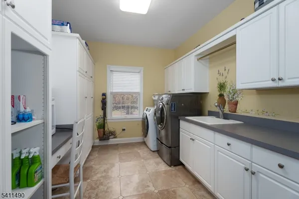 a bathroom with a toilet and a sink