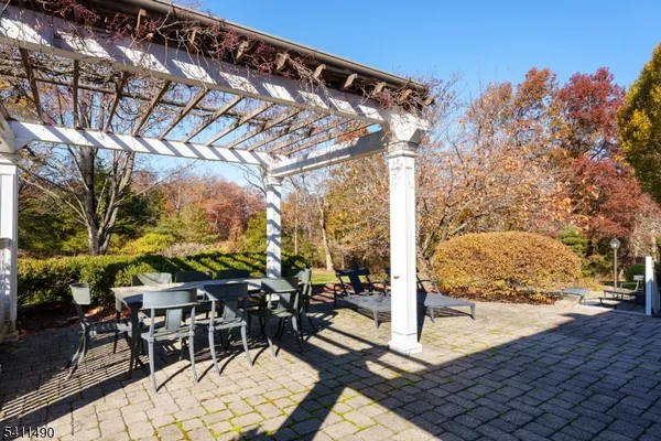 a view of chairs and tables in the patio