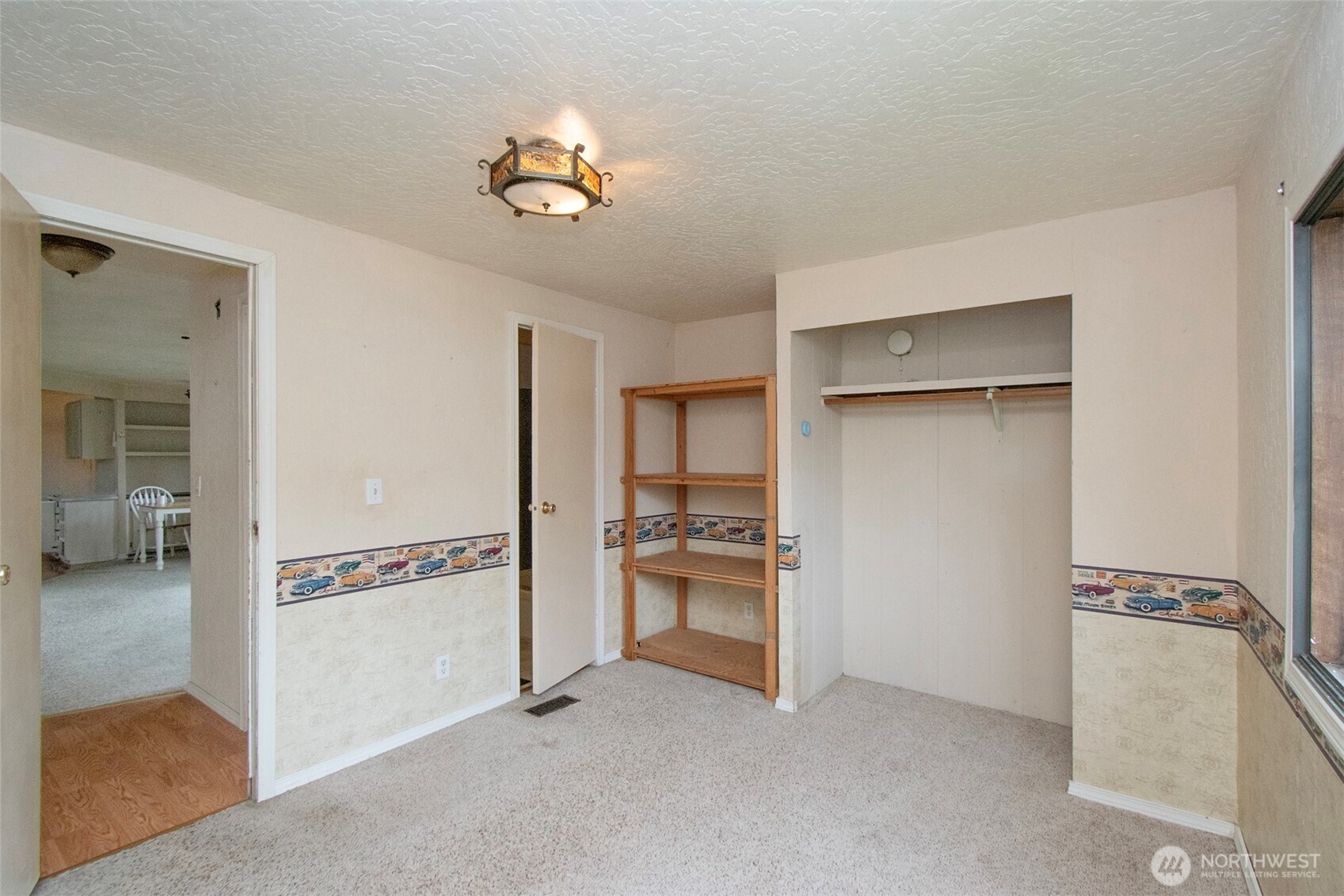 90 Baywood Village Road, Unit 34 Sequim, WA 98382 - Photo 19 of 40 a view of a kitchen with a sink and a refrigerator
