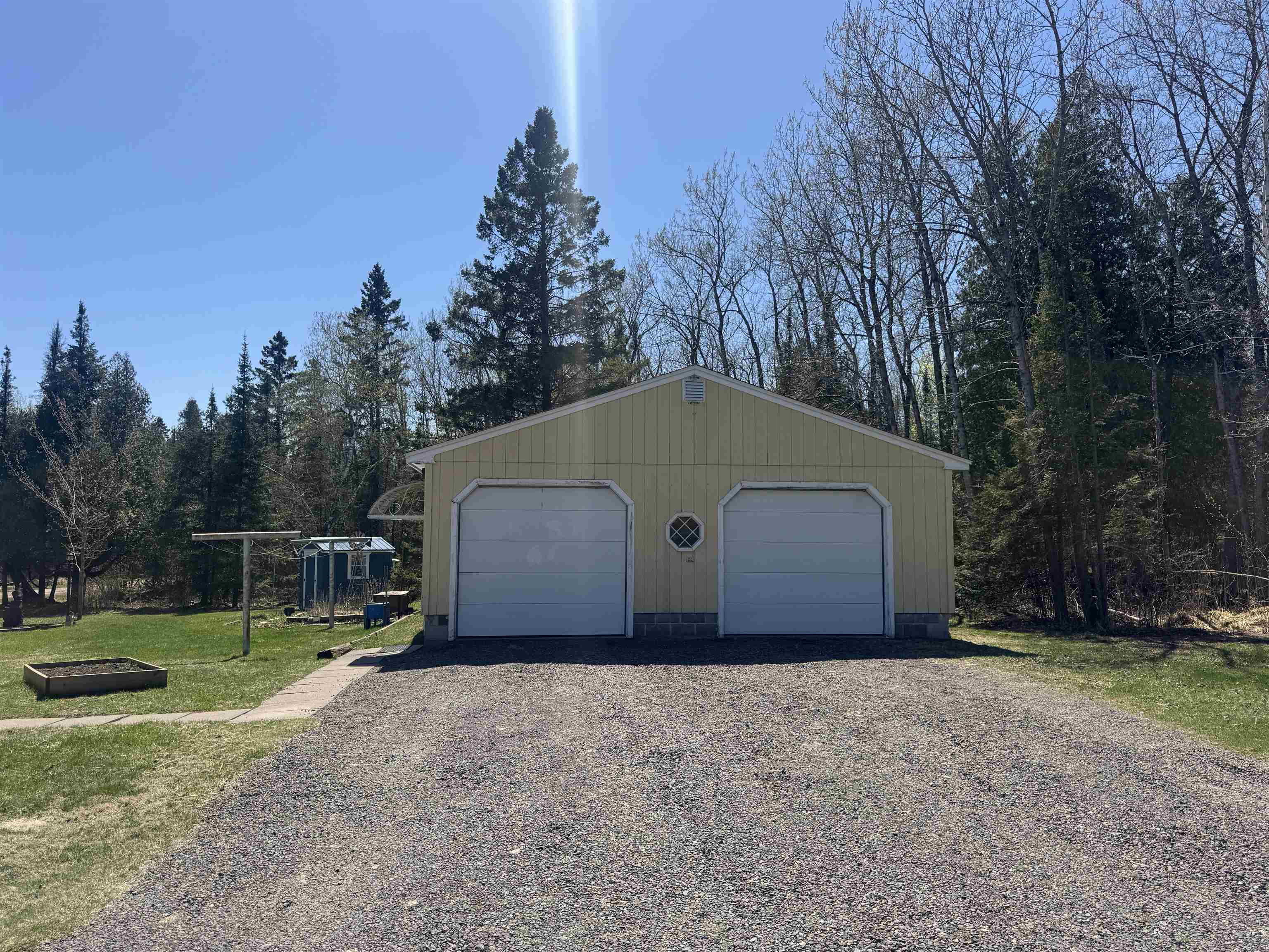 5409 Greenwood Road Duluth, MN 55804 - Photo 2 of 2 Detached garage with gravel driveway
