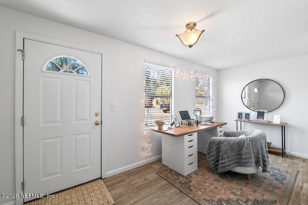 4145 Springwood Road Jacksonville, FL 32207 - Photo 11 of 33 a room with a sink and a mirror