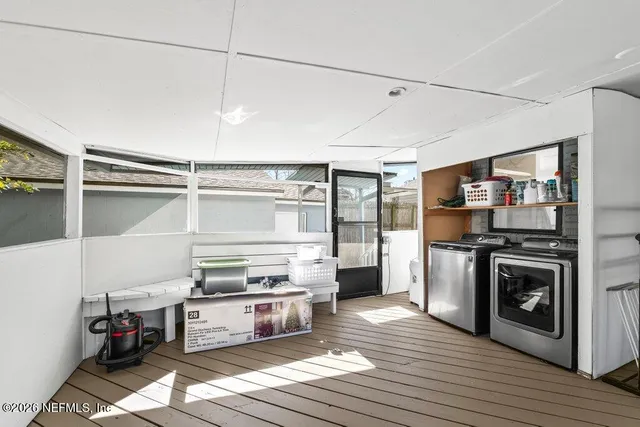 a kitchen with stainless steel appliances granite countertop a stove and a refrigerator