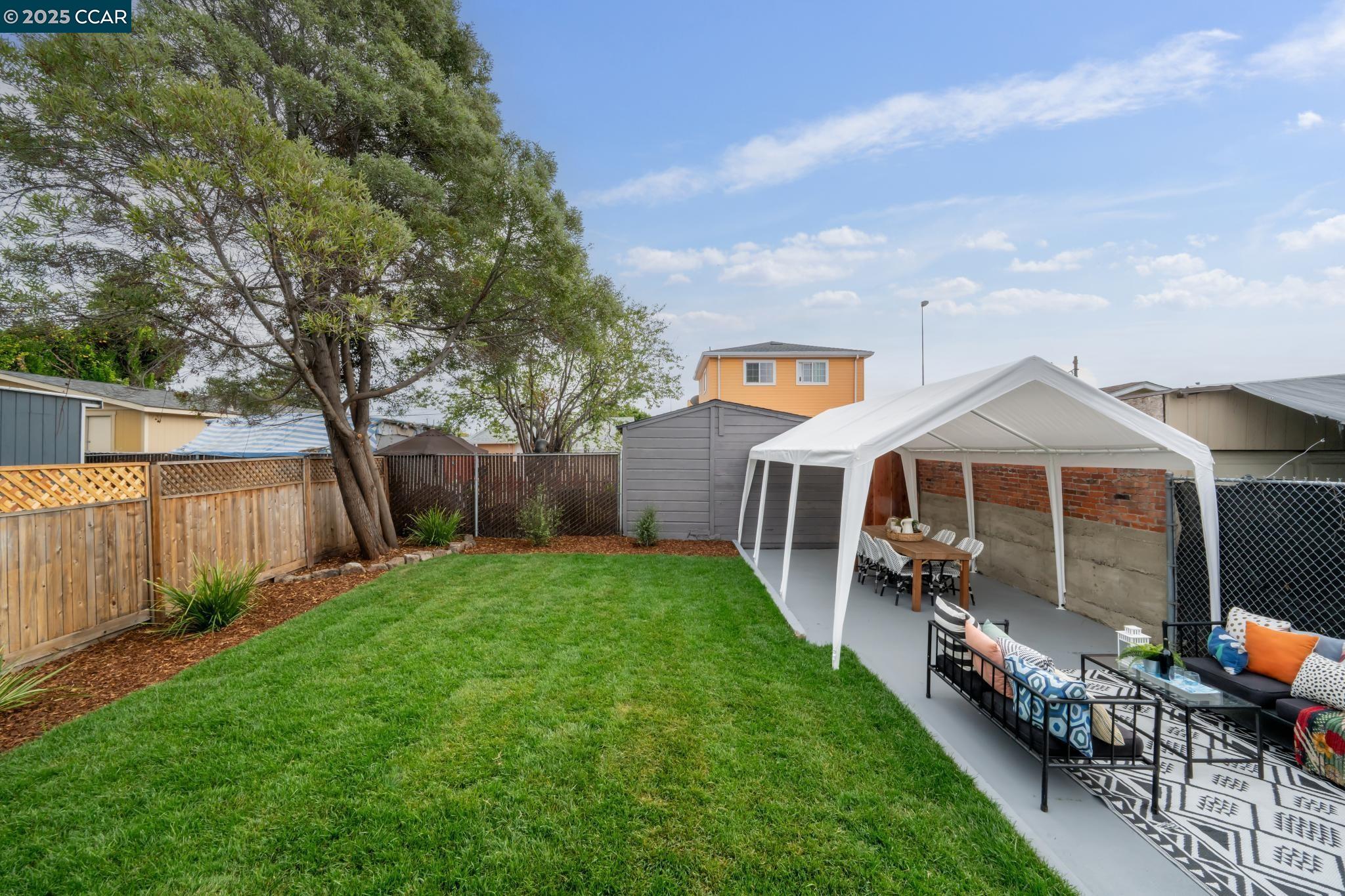 1128 60th Avenue Oakland, CA 94621 - Photo 7 of 7 a view of a yard in front of house