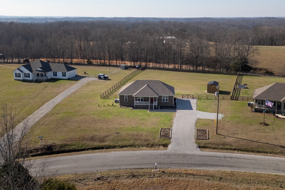 4915 Little Dry Creek Road Pulaski, TN 38478 - Photo 34 of 45 a view of a swimming pool with a yard and mountain view
