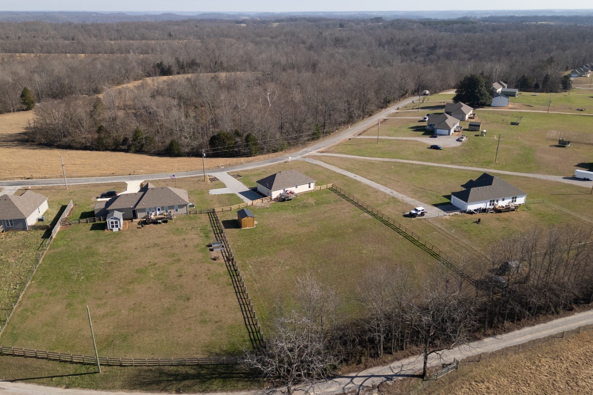 4915 Little Dry Creek Road Pulaski, TN 38478 - Photo 40 of 45 a view of a backyard with table and chairs