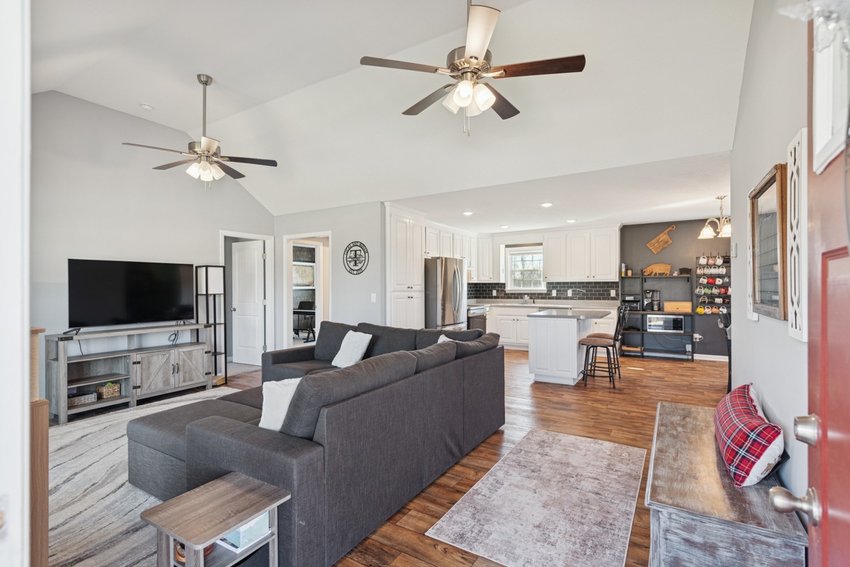 4915 Little Dry Creek Road Pulaski, TN 38478 - Photo 4 of 45 a living room with furniture and a flat screen tv