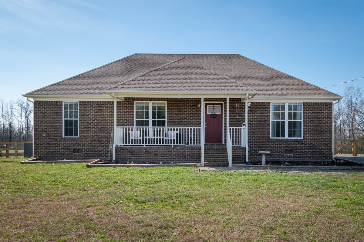 4915 Little Dry Creek Road Pulaski, TN 38478 - Photo 43 of 45 a front view of a house with a yard