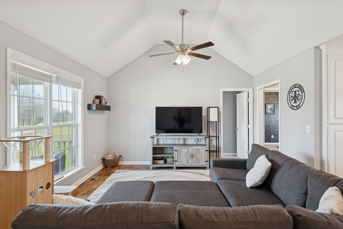 4915 Little Dry Creek Road Pulaski, TN 38478 - Photo 5 of 45 a living room with furniture and a flat screen tv