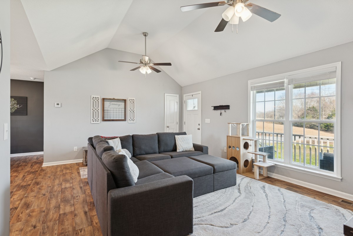 4915 Little Dry Creek Road Pulaski, TN 38478 - Photo 6 of 45 a living room with furniture and a large window