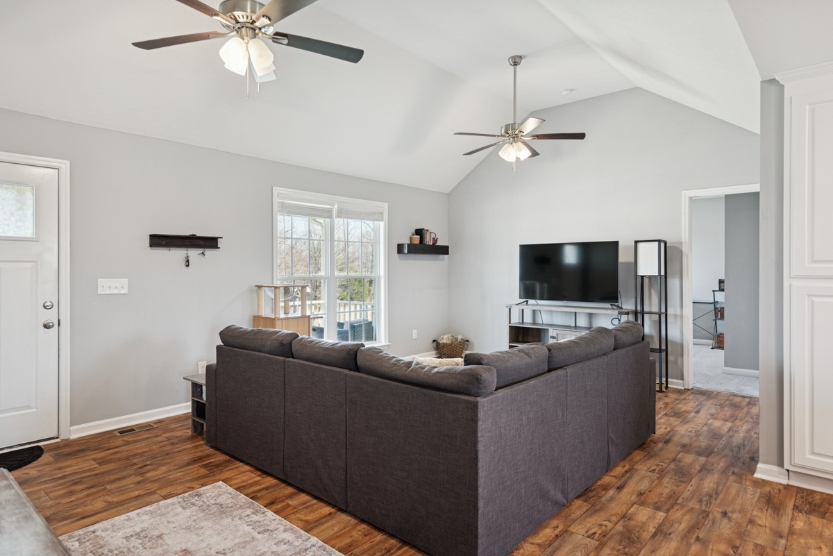 4915 Little Dry Creek Road Pulaski, TN 38478 - Photo 7 of 45 a living room with furniture and a flat screen tv