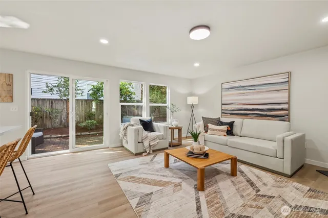 a living room with furniture and a window