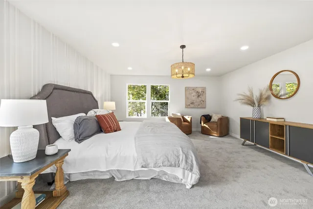 a bedroom with bed and window