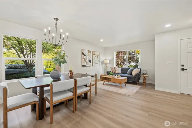 a living room with furniture and a table