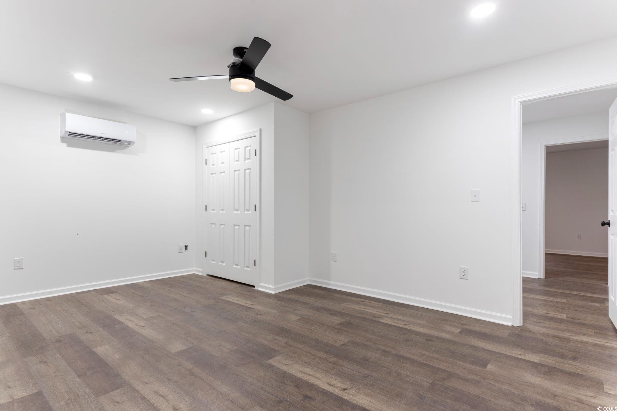 2321 Brick Drive Longs, SC 29568 - Photo 34 of 40 Empty room featuring dark wood-type flooring, recessed lighting, and a ceiling fan