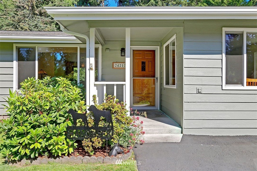 24217 4th Place West Bothell, WA 98021 - Photo 2 of 19 front view of a house with a potted plant