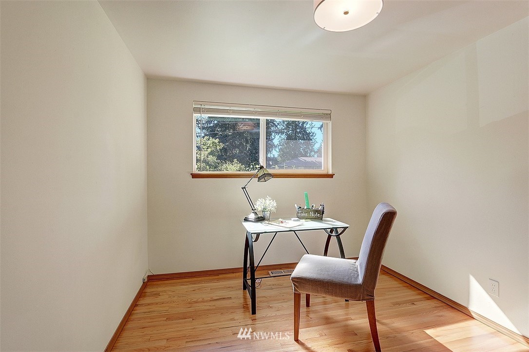 24217 4th Place West Bothell, WA 98021 - Photo 12 of 19 a dining room with furniture and wooden floor