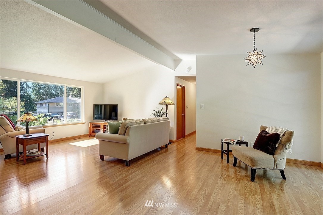 24217 4th Place West Bothell, WA 98021 - Photo 7 of 19 a living room with furniture and a wooden floor