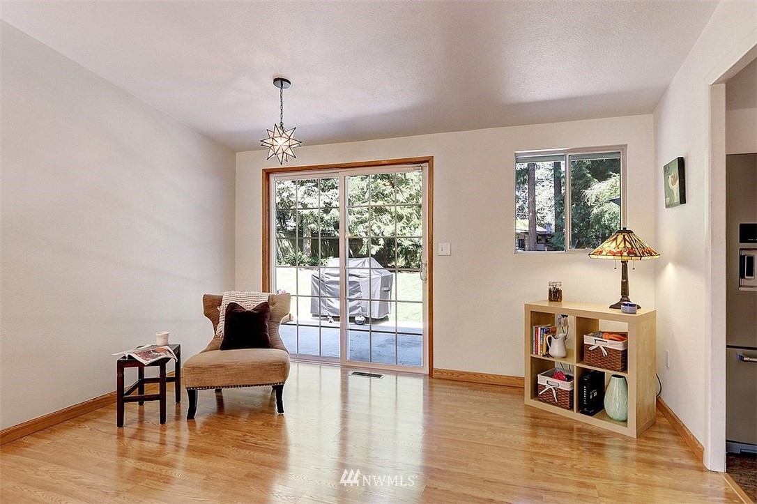 24217 4th Place West Bothell, WA 98021 - Photo 9 of 19 a living room with furniture and a wooden floor