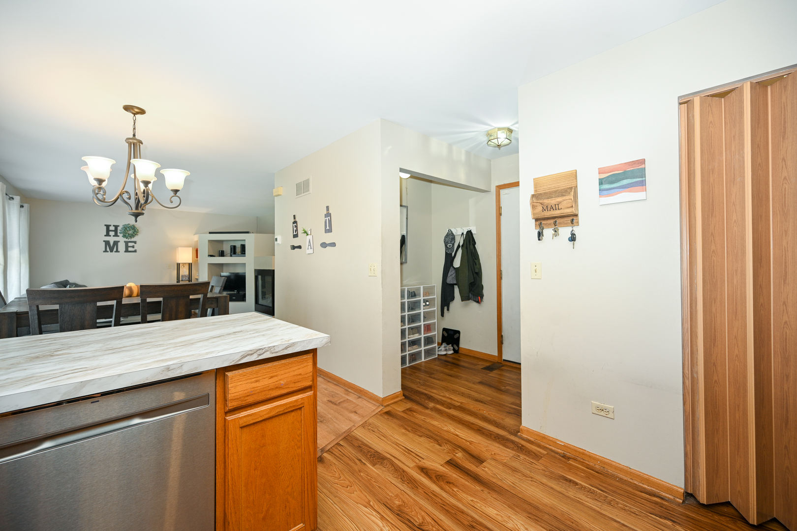 5805 Emerald Pointe Drive Plainfield, IL 60586 - Photo 11 of 25 a view of a kitchen from the hallway