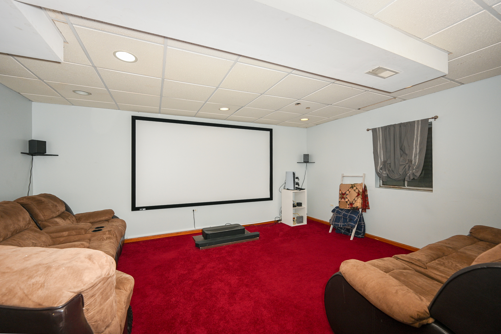 5805 Emerald Pointe Drive Plainfield, IL 60586 - Photo 21 of 25 a living room with furniture and a flat screen tv