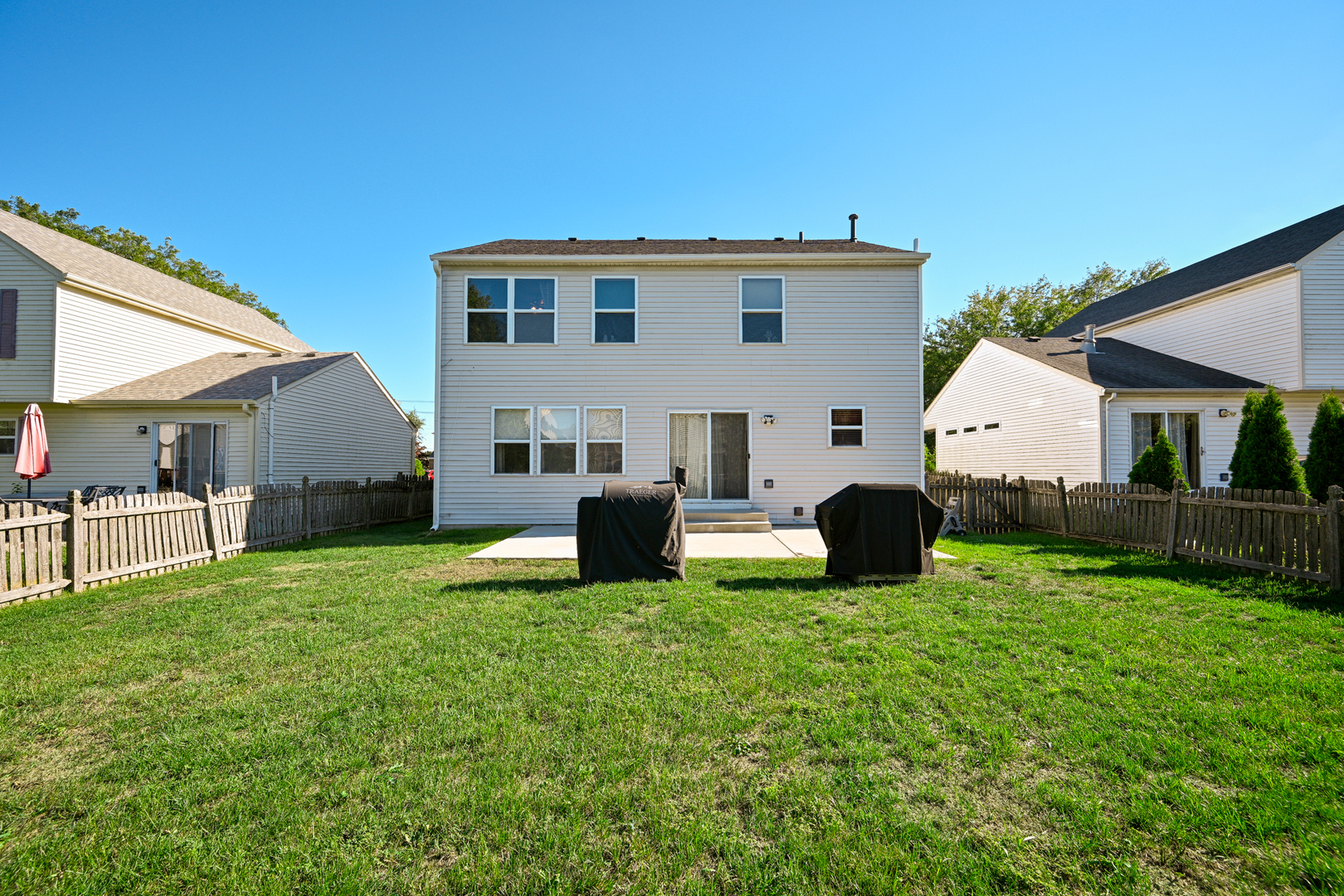 5805 Emerald Pointe Drive Plainfield, IL 60586 - Photo 25 of 25 a view of a house with backyard and sitting area