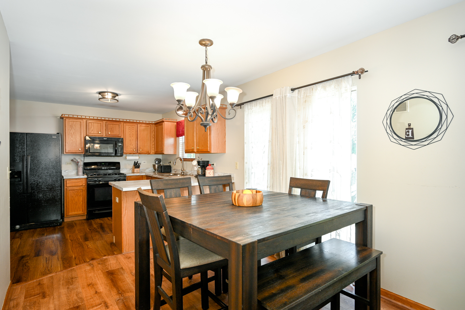 5805 Emerald Pointe Drive Plainfield, IL 60586 - Photo 8 of 25 a view of a dining room with furniture