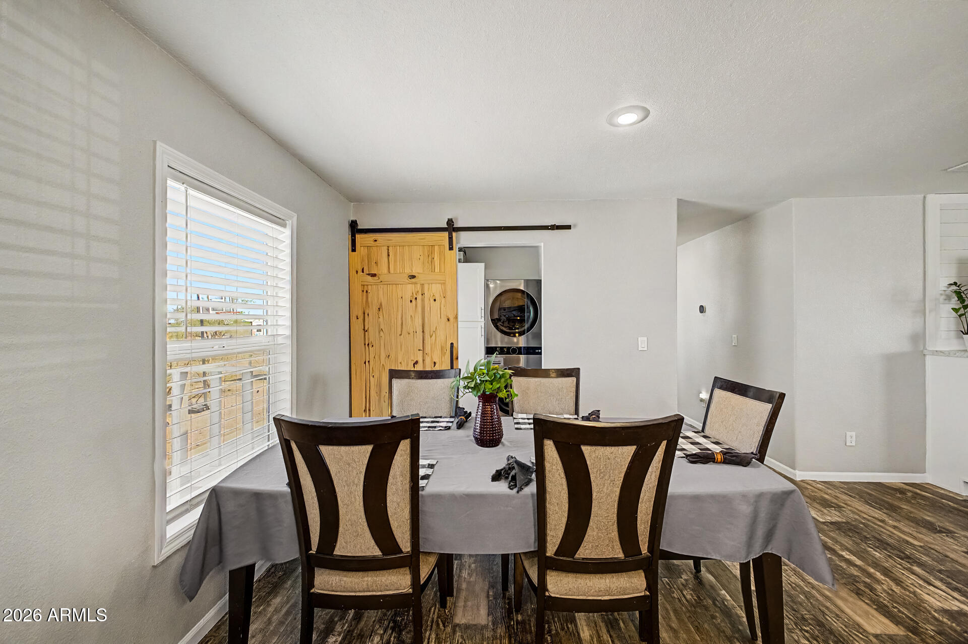 22417 West Dove Valley Road Wittmann, AZ 85361 - Photo 9 of 53 a view of a dining room with furniture and window