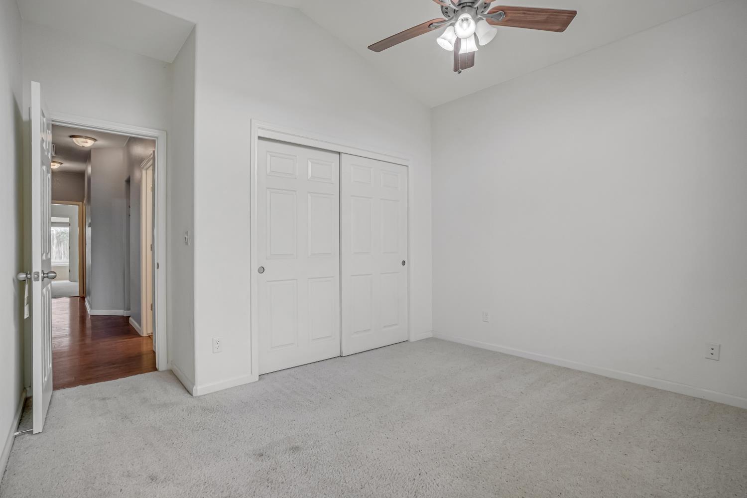 3062 North Filbert Avenue Fresno, CA 93727 - Photo 14 of 41 a view of an empty room with chandelier fan