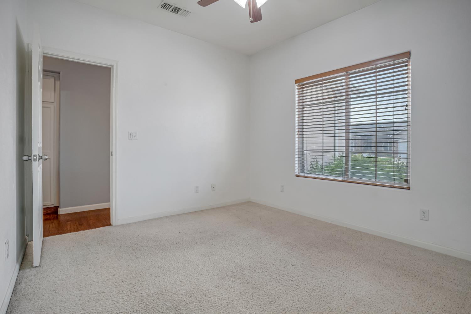 3062 North Filbert Avenue Fresno, CA 93727 - Photo 25 of 41 a view of an empty room with a window