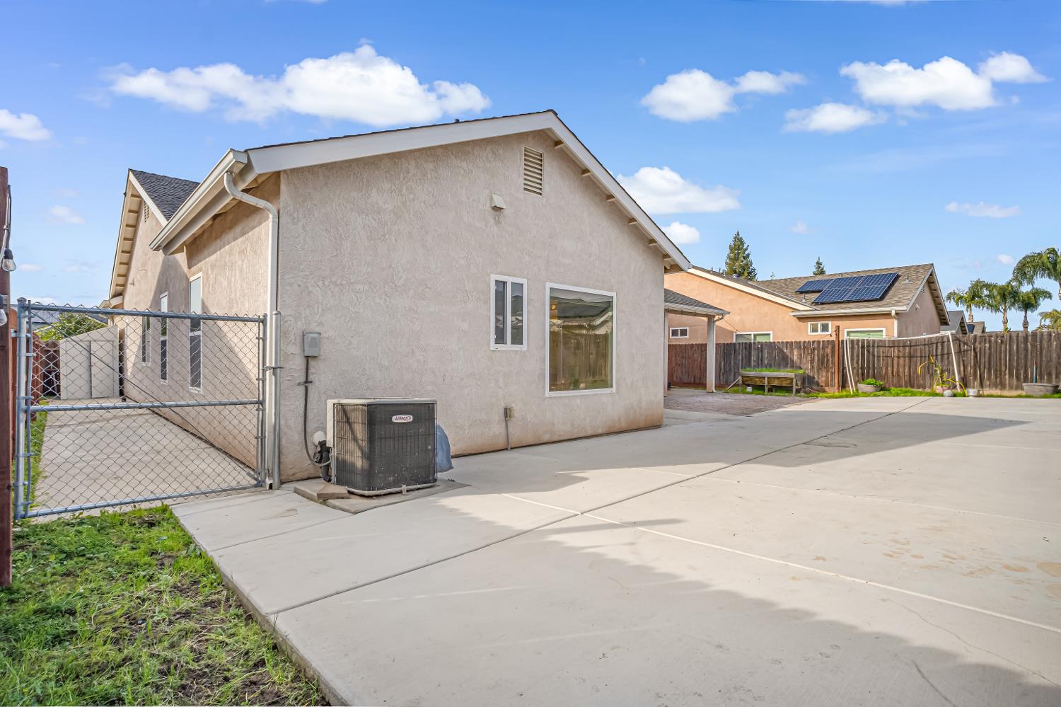 3062 North Filbert Avenue Fresno, CA 93727 - Photo 33 of 41 a front view of a house with a yard
