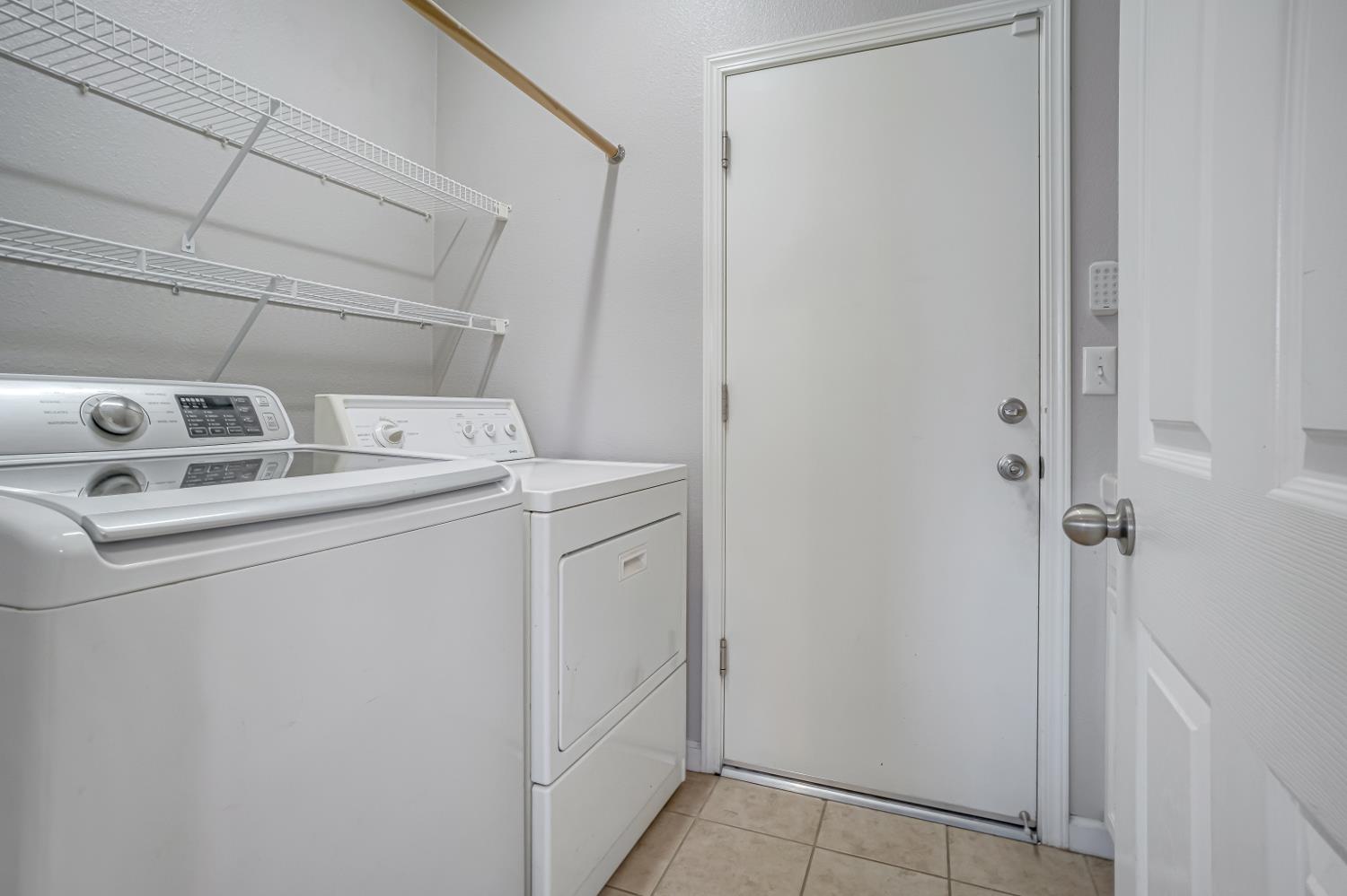 3062 North Filbert Avenue Fresno, CA 93727 - Photo 36 of 41 a utility room with dryer and washer