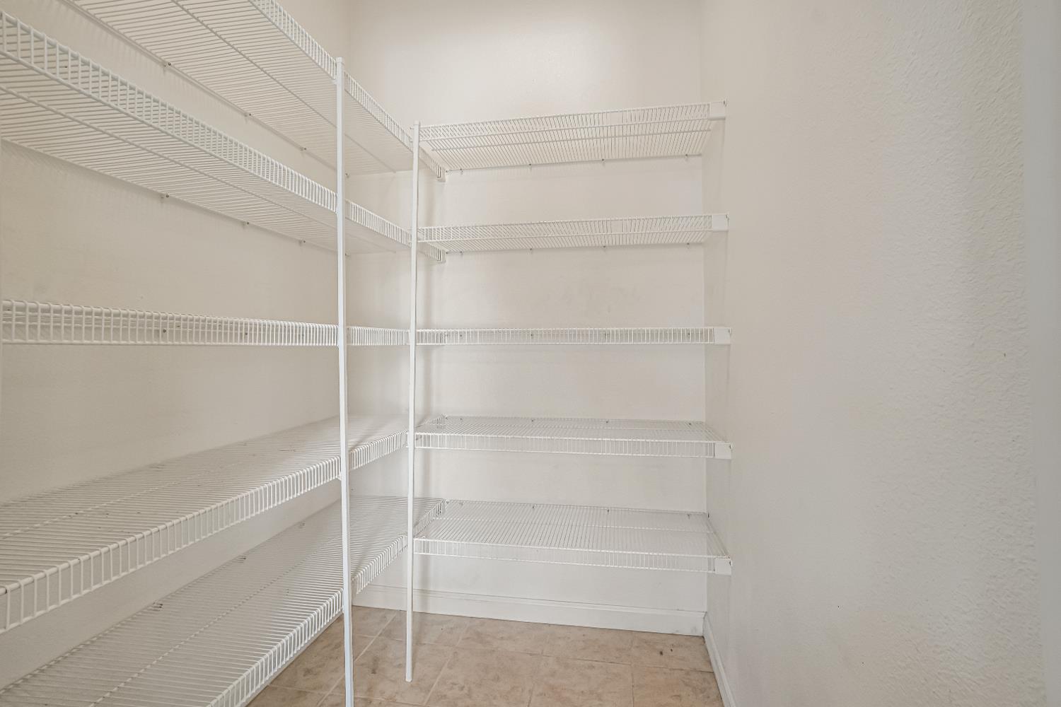 3062 North Filbert Avenue Fresno, CA 93727 - Photo 10 of 41 a view of an empty walk in closet