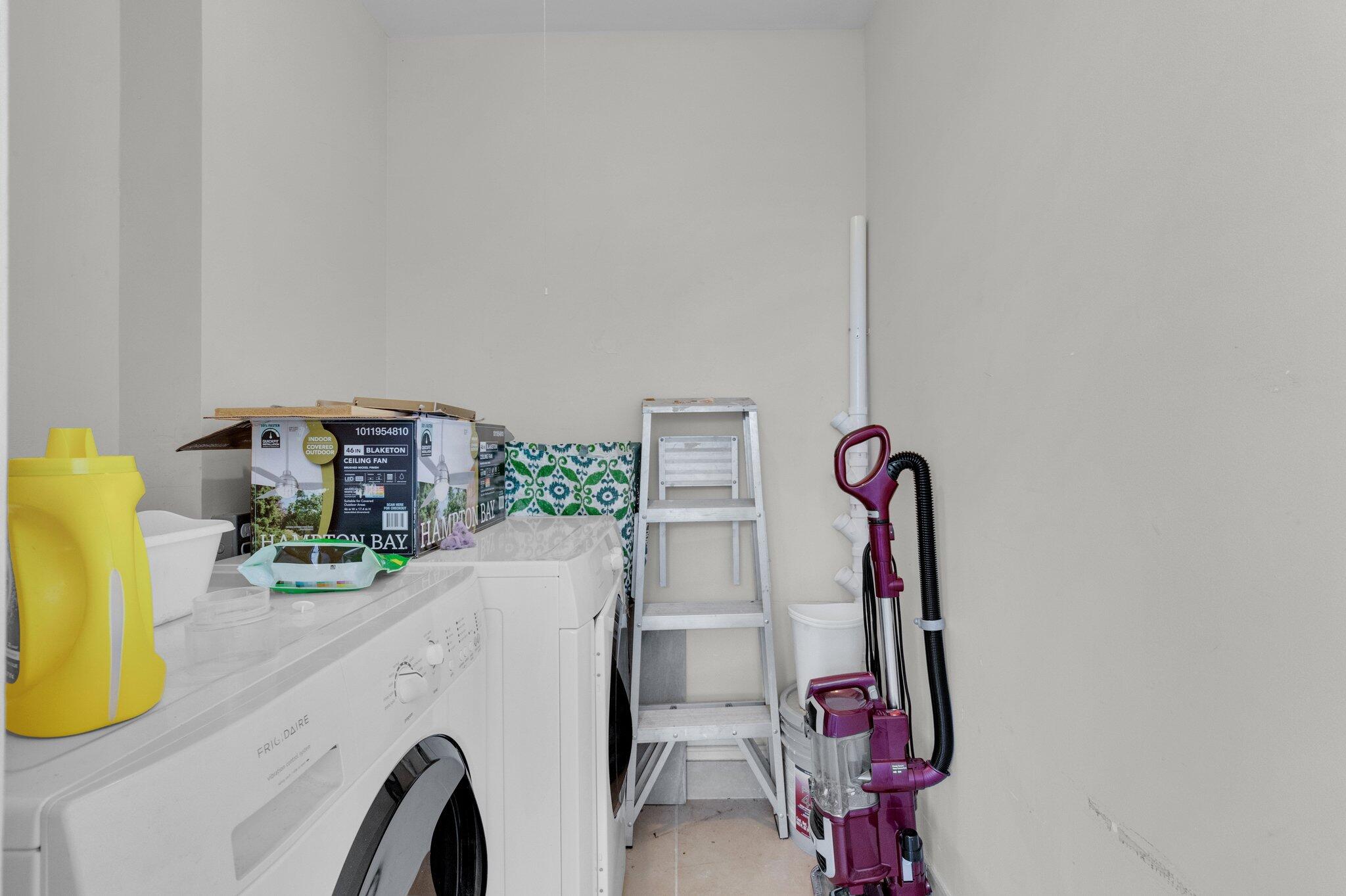 392 Monaco Way, Unit 392 Delray Beach, FL 33446 - Photo 26 of 47 a view of a room with gym equipment