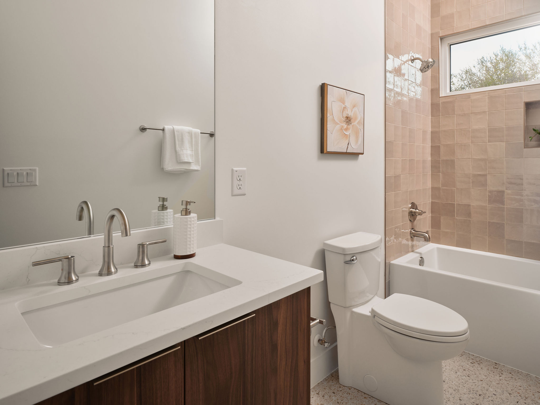 1215 Fort Branch Boulevard, Unit 2 Austin, TX 78721 - Photo 11 of 23 a bathroom with a sink a toilet and shower