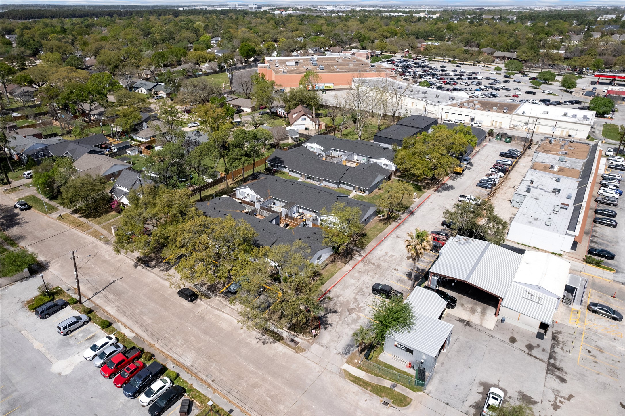 2675 Gessner Road Houston, TX 77080 - Photo 34 of 40 an aerial view of residential houses with outdoor space