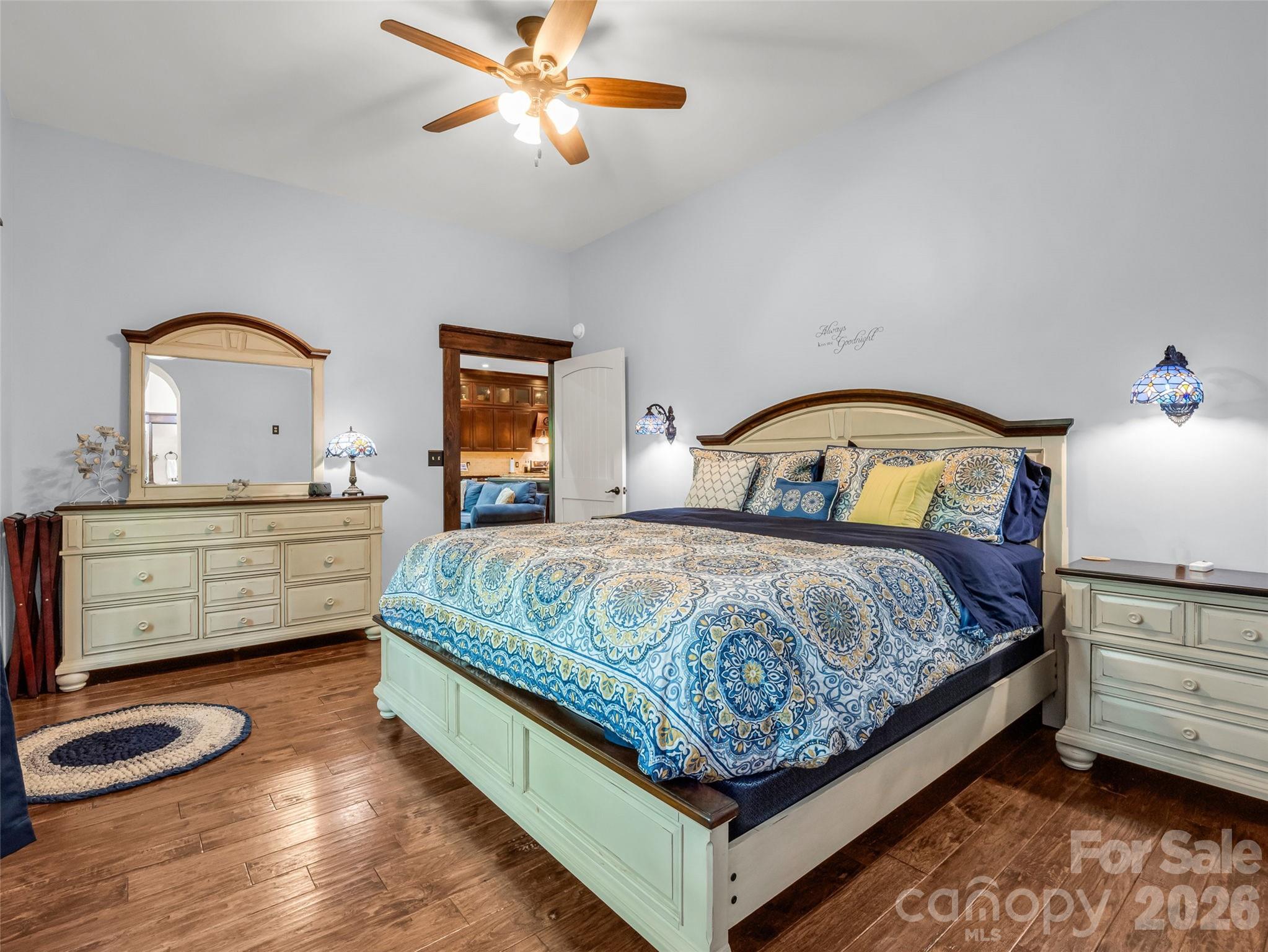 174 Rock Ridge Lake Lure, NC 28746 - Photo 16 of 48 a bedroom with a bed and a dresser