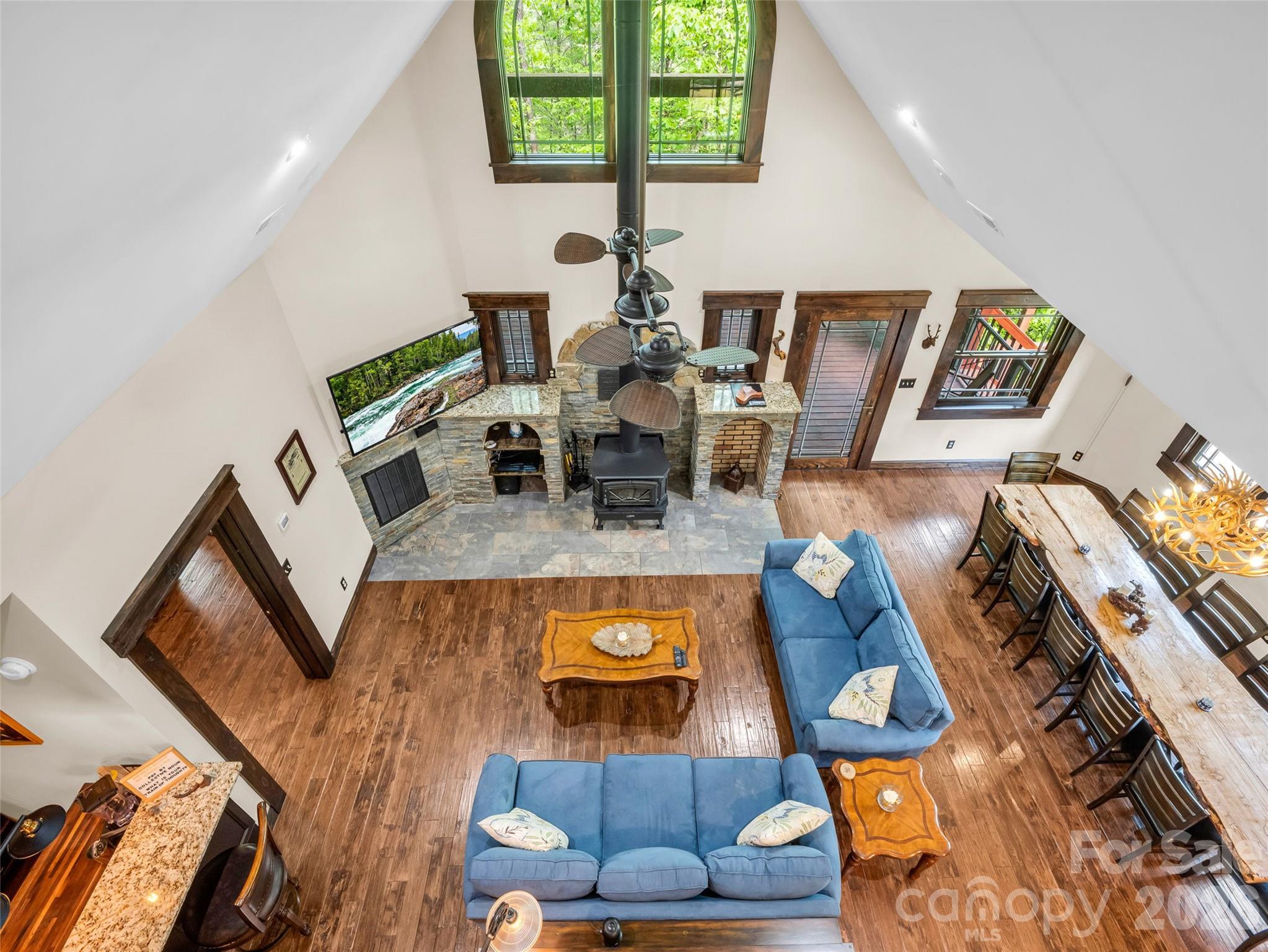 174 Rock Ridge Lake Lure, NC 28746 - Photo 25 of 48 a living room with furniture and a fireplace