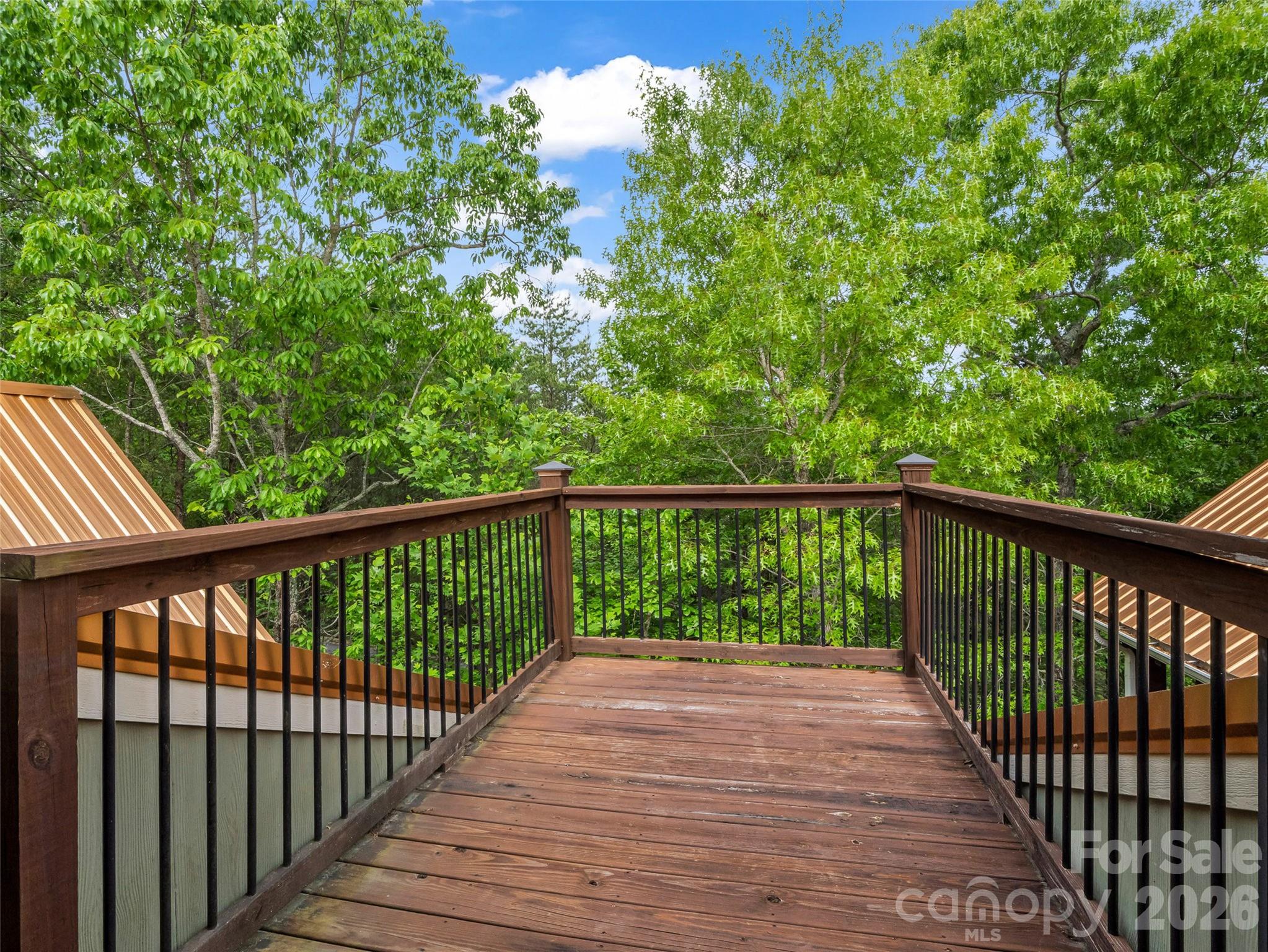 174 Rock Ridge Lake Lure, NC 28746 - Photo 27 of 48 a view of balcony with wooden floor