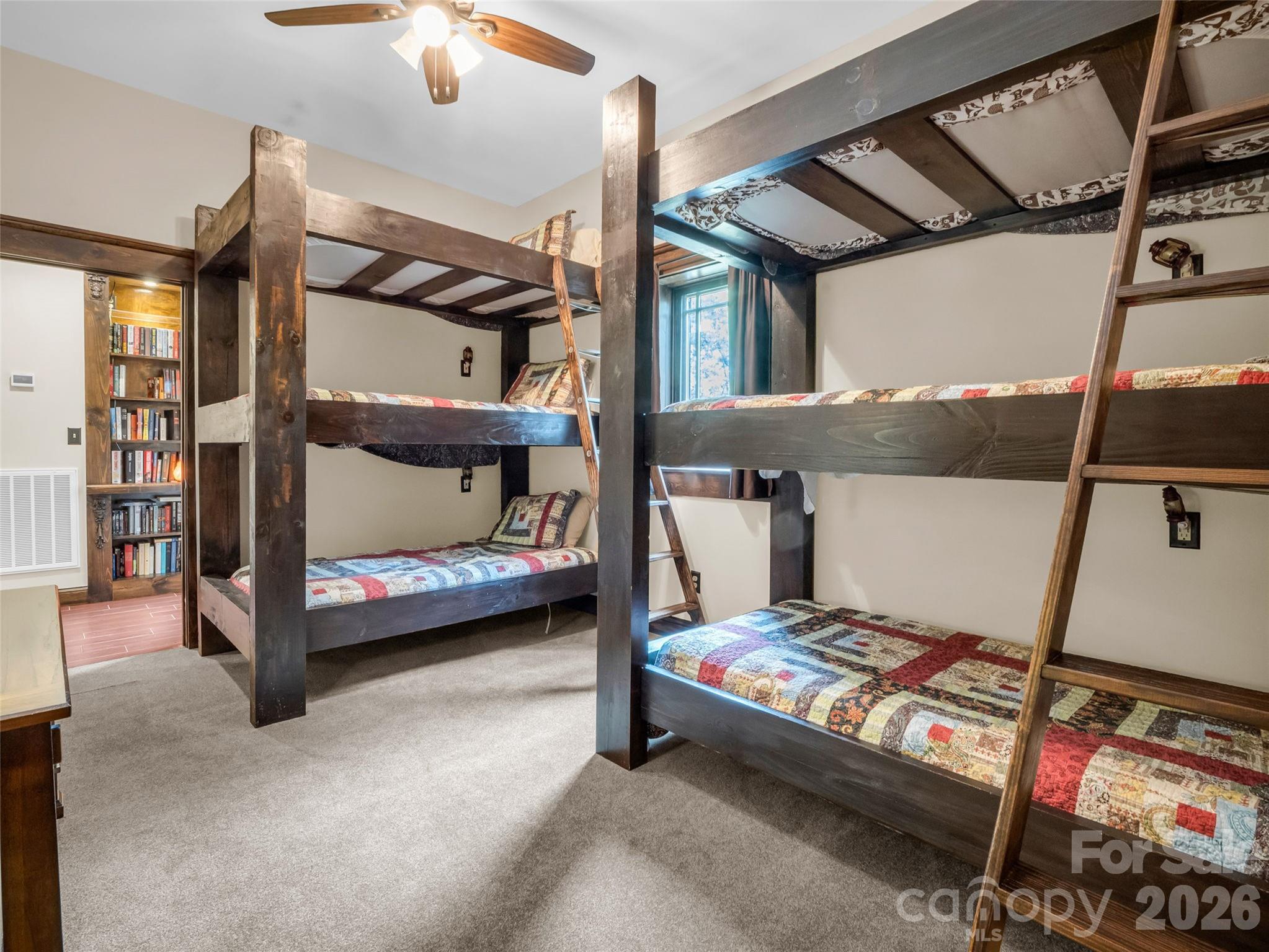 174 Rock Ridge Lake Lure, NC 28746 - Photo 32 of 48 a bedroom with bed and a window