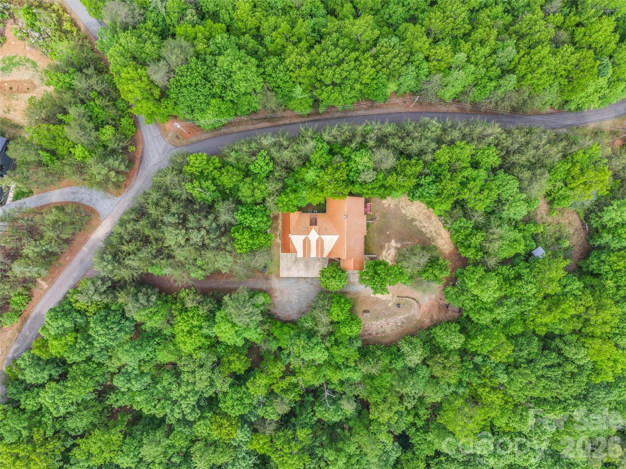 174 Rock Ridge Lake Lure, NC 28746 - Photo 43 of 48 a view of a garden with an outdoor space