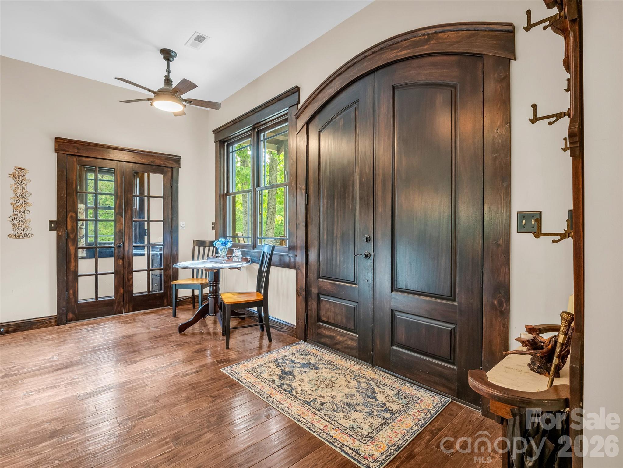 174 Rock Ridge Lake Lure, NC 28746 - Photo 6 of 48 a living room with furniture rug and wooden floor