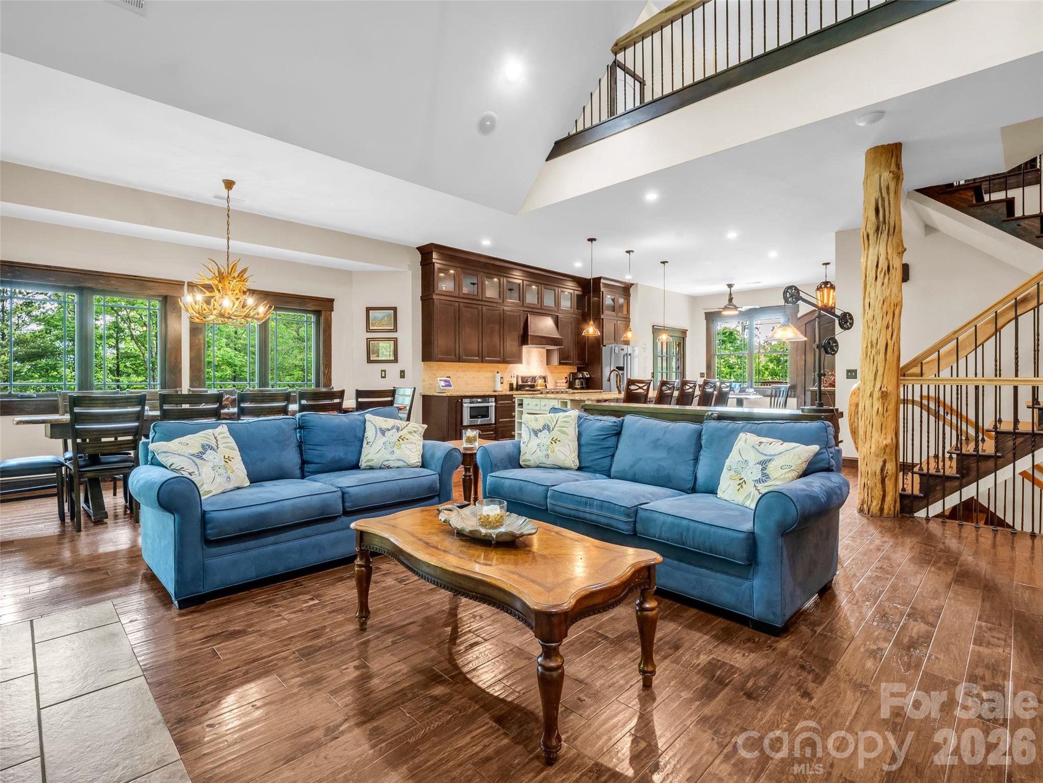 174 Rock Ridge Lake Lure, NC 28746 - Photo 9 of 48 a living room with furniture and a large window