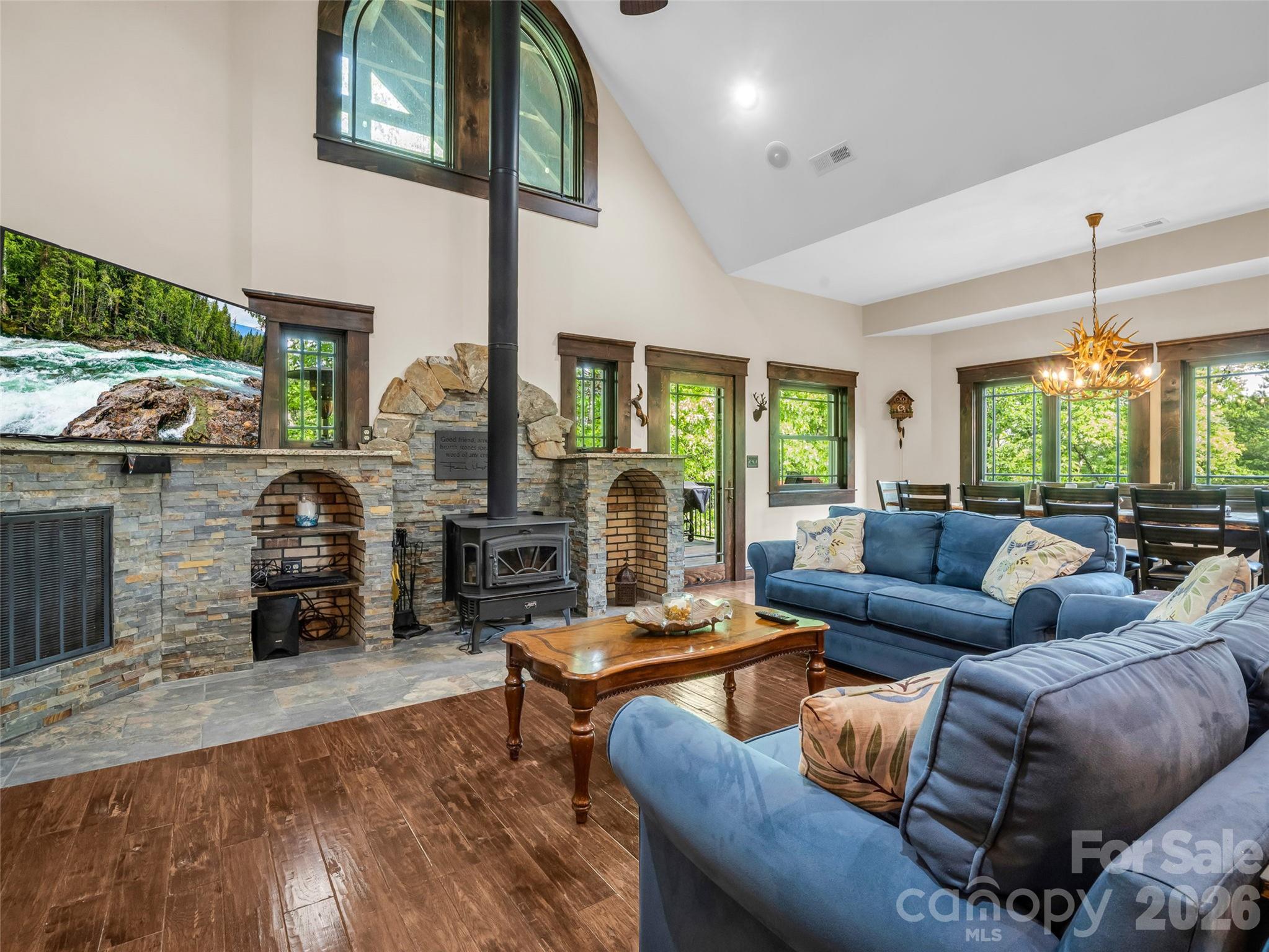174 Rock Ridge Lake Lure, NC 28746 - Photo 10 of 48 a living room with furniture and a large window
