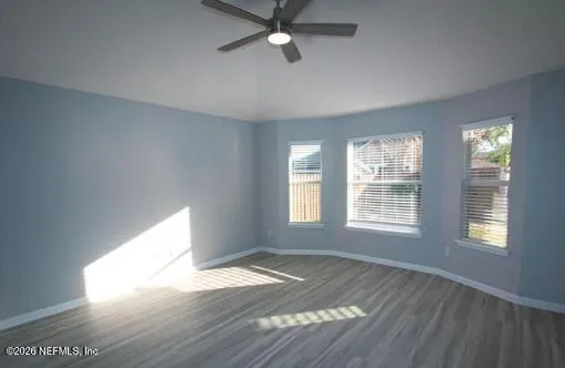 a kitchen with stainless steel appliances a refrigerator and cabinets