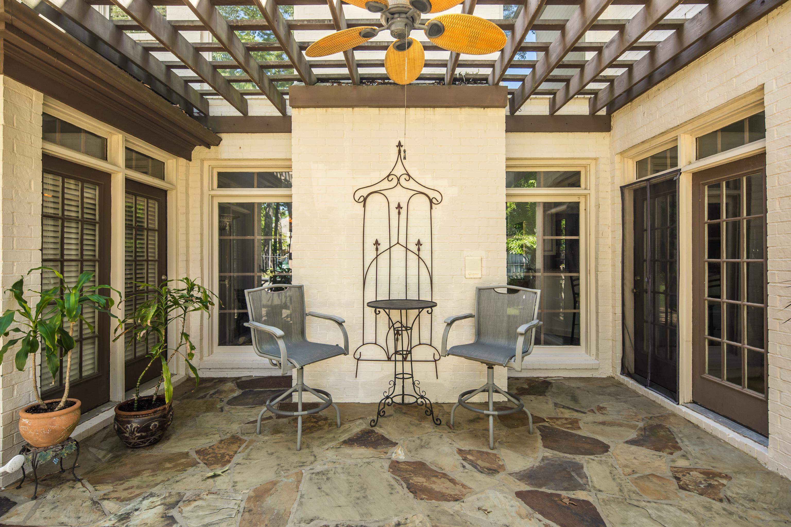 210 Ivy Grove Lane Collierville, TN 38017 - Photo 35 of 40 a view of a chairs and table in a porch