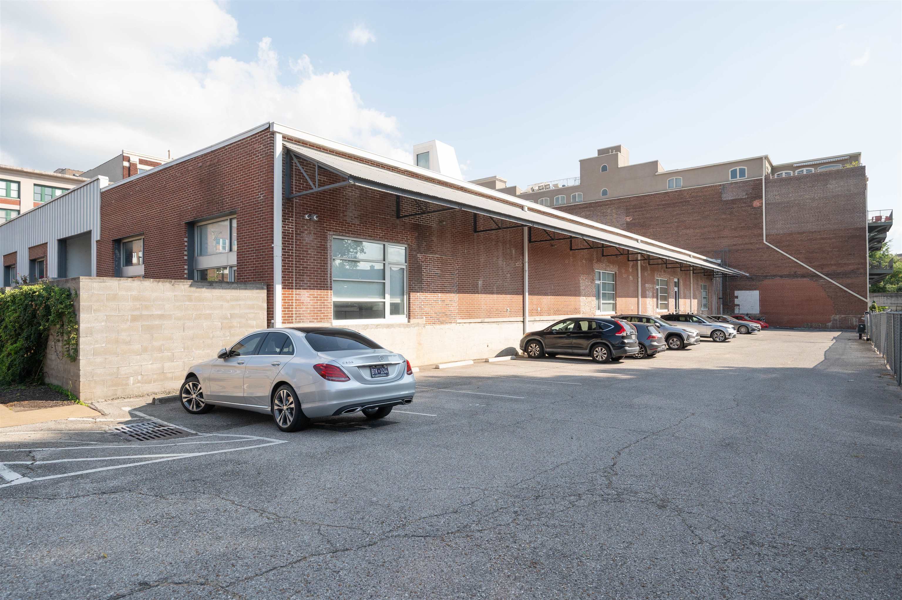 415 South Front Street, Unit 114 Memphis, TN 38103 - Photo 21 of 26 a car parked in front of a house