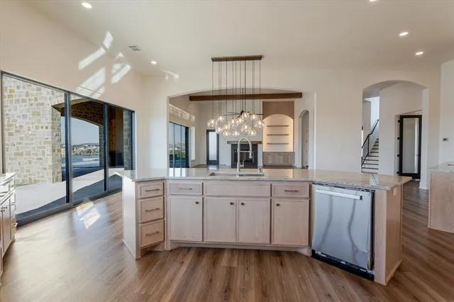 a room with furniture and wooden floor