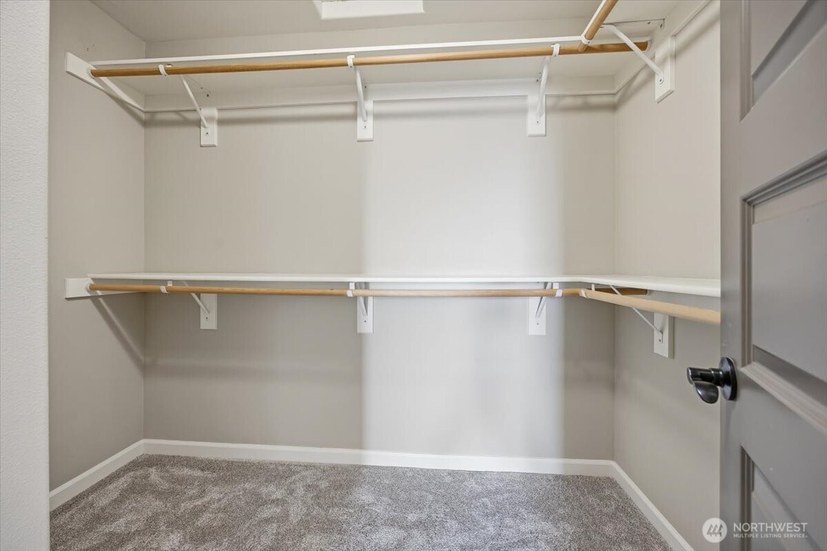 6304 Turf Paradise Drive Pasco, WA 99301 - Photo 15 of 40 a view of a room with racks on the wall