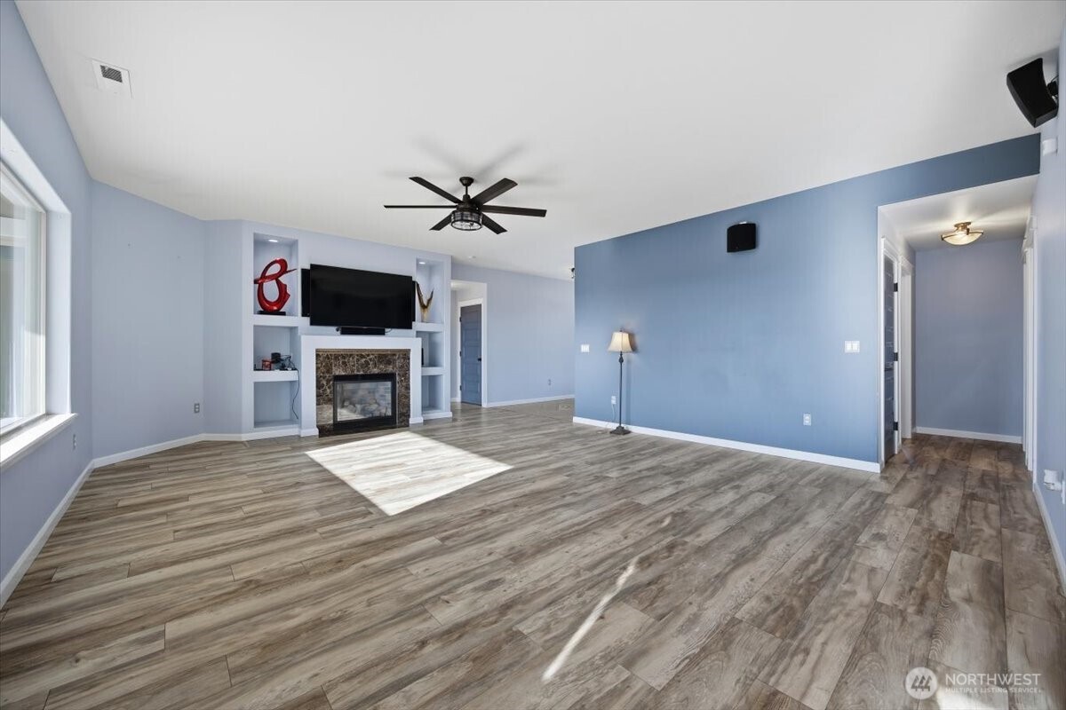 6304 Turf Paradise Drive Pasco, WA 99301 - Photo 18 of 40 a view of livingroom with furniture and a fireplace