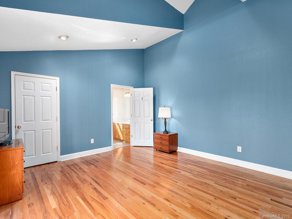 23 Yarrow Road Waynesville, NC 28785 - Photo 14 of 24 a view of empty room with wooden floor
